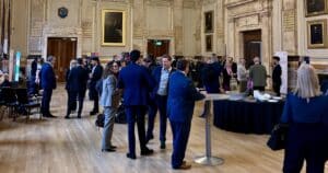 Attendees of Workplace Futures 2025 standing in the main hall of the conference
