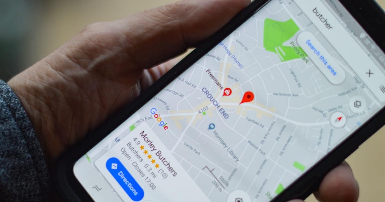 A person using Google Maps on a mobile phone