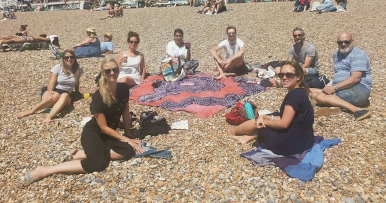 The Magenta team having lunch on Brighton beach in summer 2020