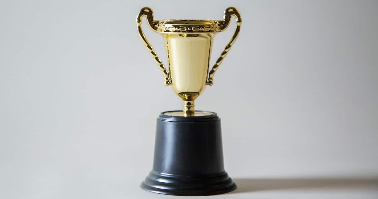 An awards trophy on a blank background
